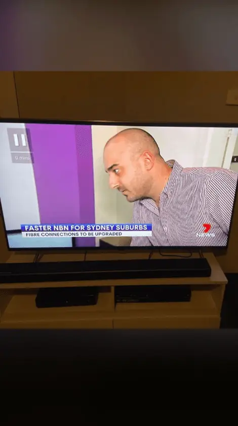 Sam Halcrow being interviewed on television